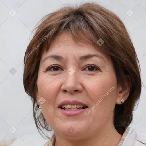 Joyful white adult female with medium  brown hair and brown eyes