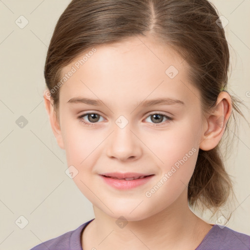 Joyful white child female with medium  brown hair and brown eyes