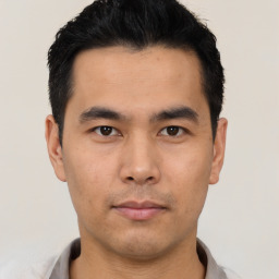 Neutral asian young-adult male with short  black hair and brown eyes