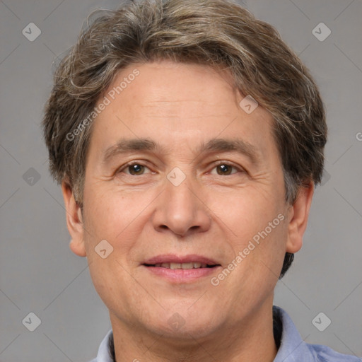 Joyful white adult male with short  brown hair and brown eyes