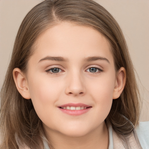 Joyful white child female with long  brown hair and brown eyes