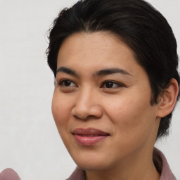 Joyful asian young-adult female with short  brown hair and brown eyes