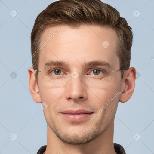 Joyful white young-adult male with short  brown hair and grey eyes