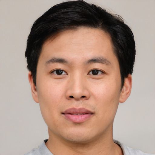 Neutral asian young-adult male with short  black hair and brown eyes