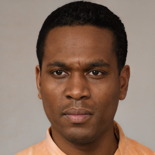 Neutral black young-adult male with short  black hair and brown eyes