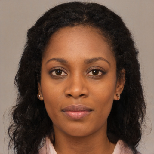 Neutral black young-adult female with long  black hair and brown eyes