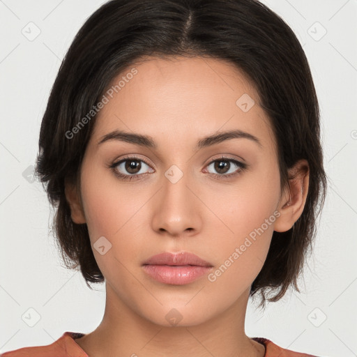 Neutral white young-adult female with medium  brown hair and brown eyes