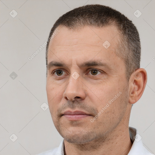 Neutral white adult male with short  black hair and brown eyes