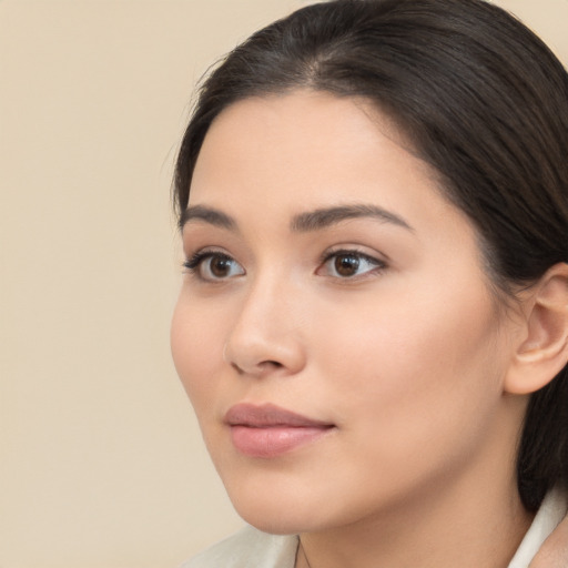 Neutral white young-adult female with medium  brown hair and brown eyes