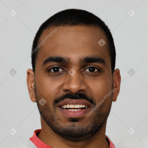 Joyful black young-adult male with short  black hair and brown eyes