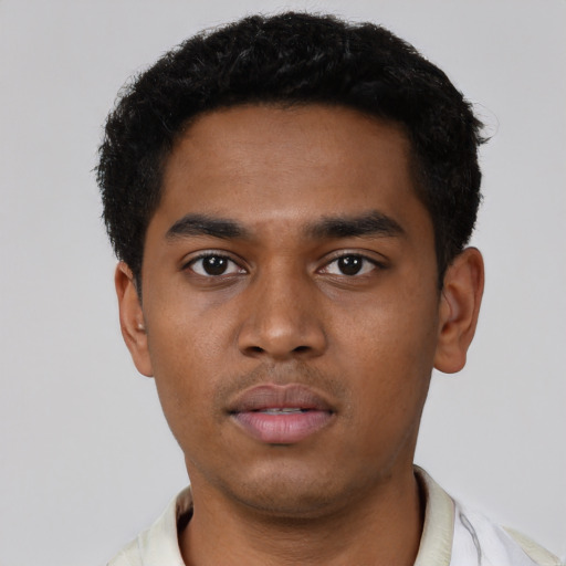 Neutral black young-adult male with short  black hair and brown eyes
