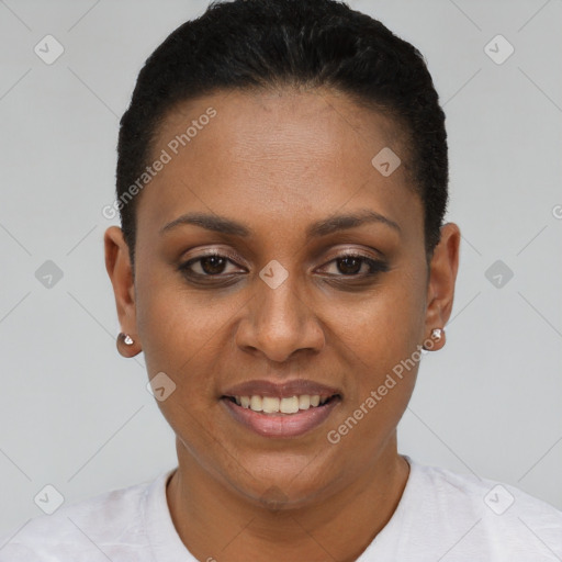 Joyful black young-adult female with short  black hair and brown eyes