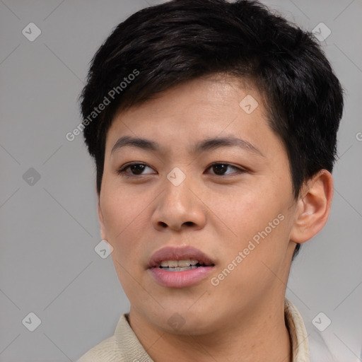 Joyful asian young-adult female with short  brown hair and brown eyes