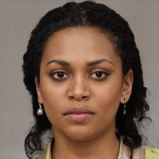 Neutral black young-adult female with long  black hair and brown eyes