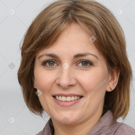 Joyful white adult female with medium  brown hair and grey eyes