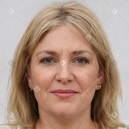 Joyful white adult female with long  brown hair and brown eyes