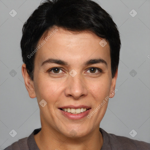 Joyful white young-adult male with short  black hair and brown eyes