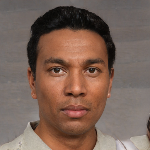 Neutral white young-adult male with short  black hair and brown eyes