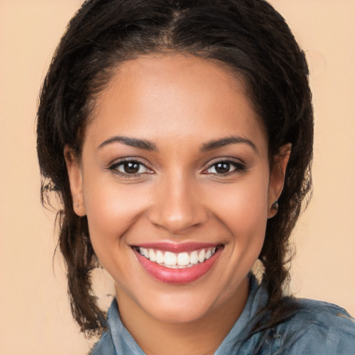 Joyful white young-adult female with long  brown hair and brown eyes