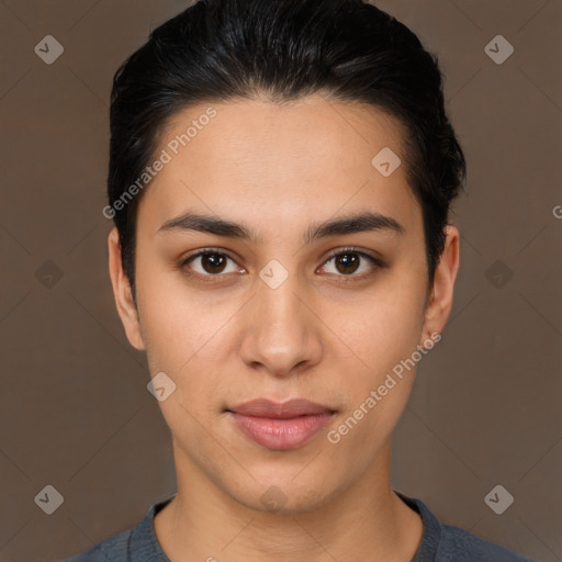 Joyful latino young-adult female with short  brown hair and brown eyes