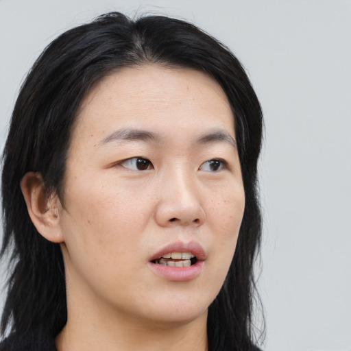 Neutral asian young-adult male with medium  black hair and brown eyes