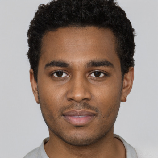 Neutral black young-adult male with short  brown hair and brown eyes