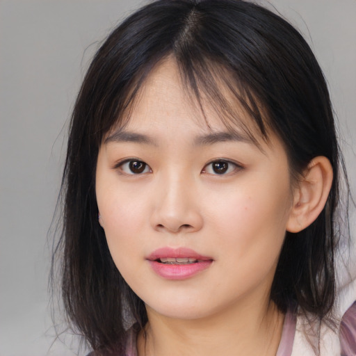 Neutral asian young-adult female with medium  brown hair and brown eyes