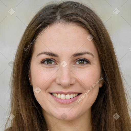 Joyful white young-adult female with long  brown hair and green eyes