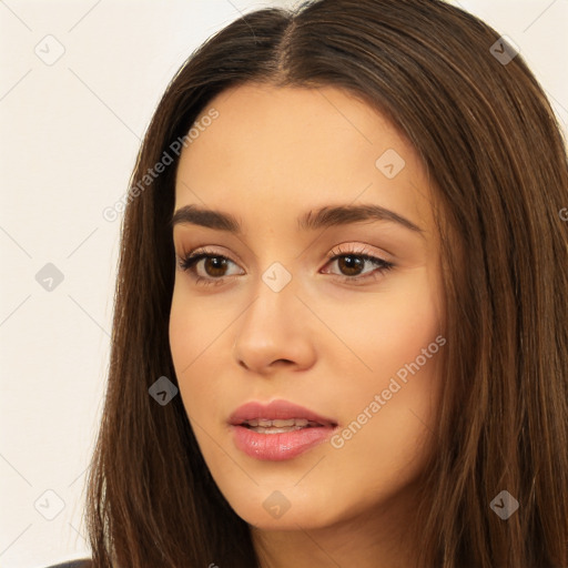 Neutral white young-adult female with long  brown hair and brown eyes