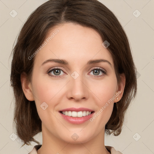 Joyful white young-adult female with medium  brown hair and green eyes