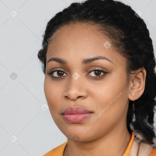 Joyful latino young-adult female with long  black hair and brown eyes