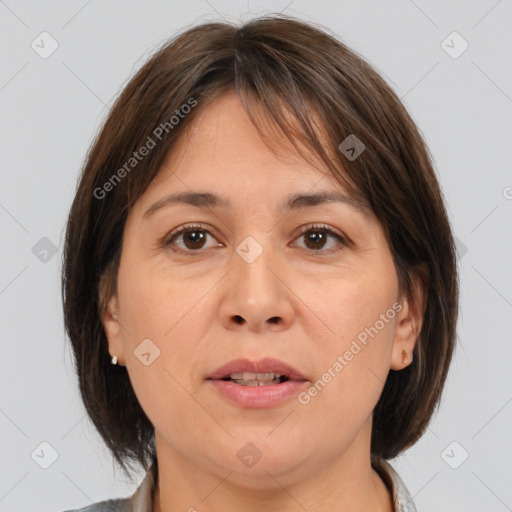 Joyful white adult female with medium  brown hair and brown eyes