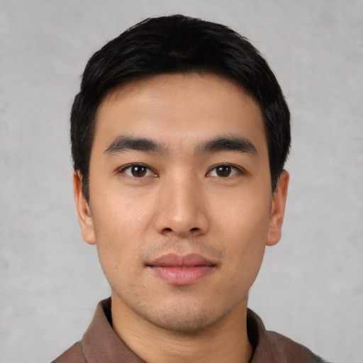 Neutral asian young-adult male with short  black hair and brown eyes