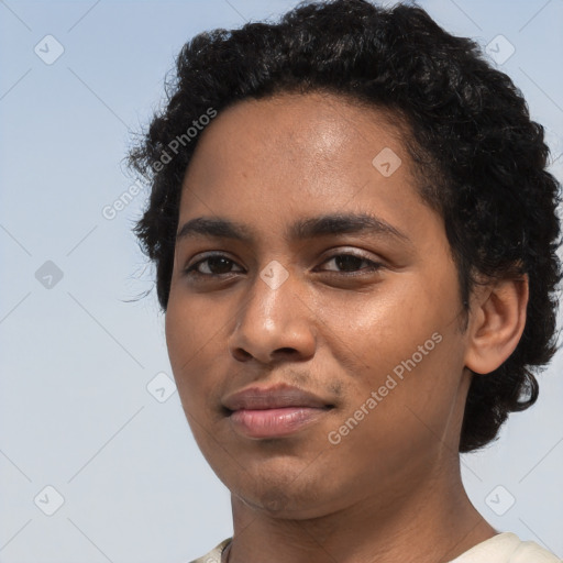 Joyful latino young-adult female with short  black hair and brown eyes
