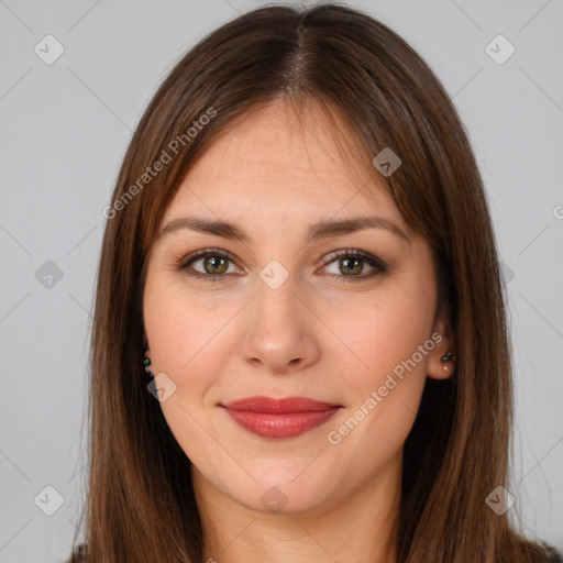 Joyful white young-adult female with long  brown hair and brown eyes