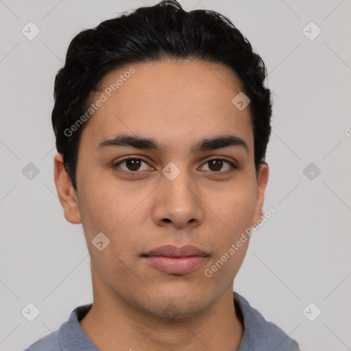 Neutral latino young-adult male with short  black hair and brown eyes