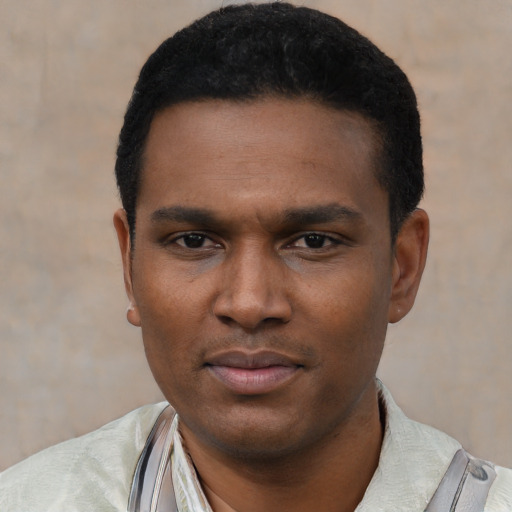 Neutral black young-adult male with short  black hair and brown eyes