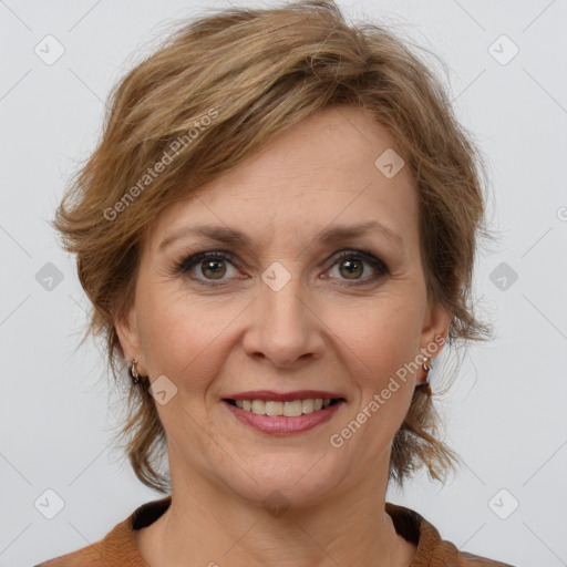 Joyful white adult female with medium  brown hair and brown eyes