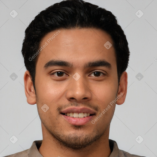 Joyful latino young-adult male with short  black hair and brown eyes