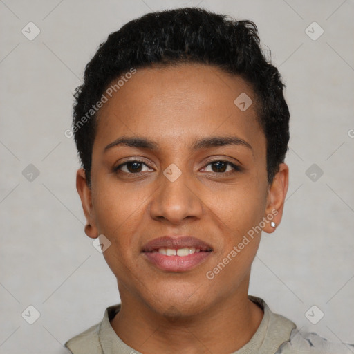 Joyful black young-adult female with short  black hair and brown eyes