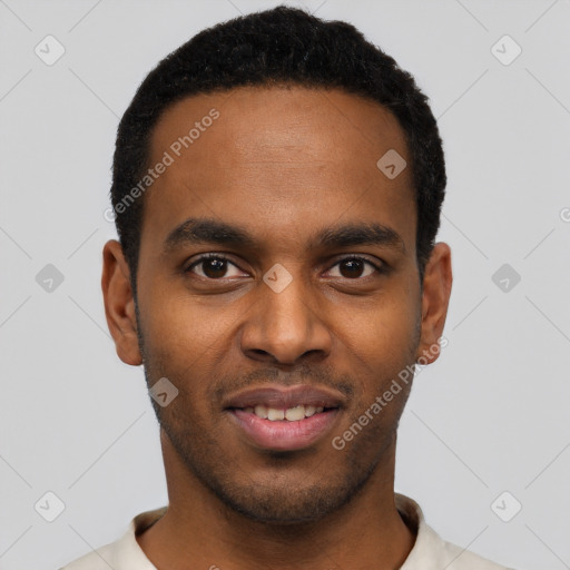 Joyful black young-adult male with short  black hair and brown eyes