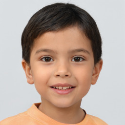 Joyful white child male with short  brown hair and brown eyes