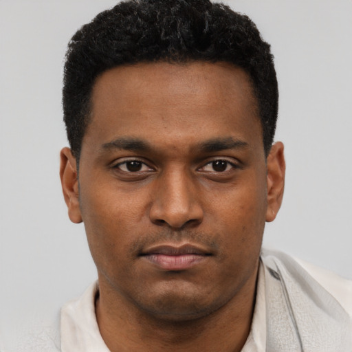 Neutral latino young-adult male with short  brown hair and brown eyes