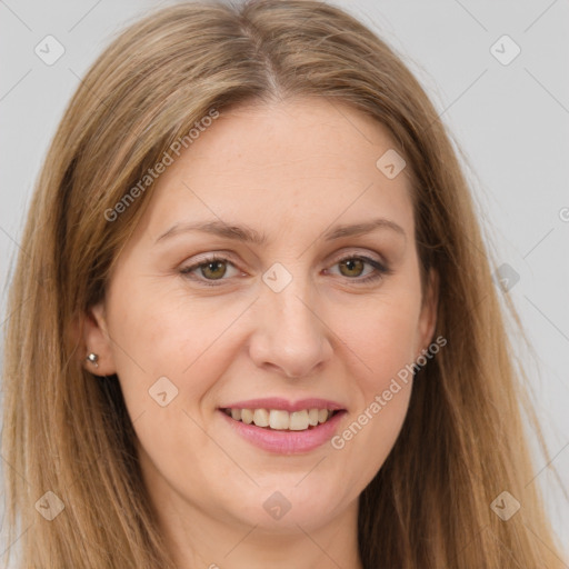 Joyful white adult female with long  brown hair and brown eyes