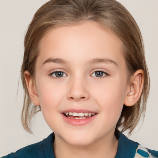 Joyful white child female with medium  brown hair and brown eyes