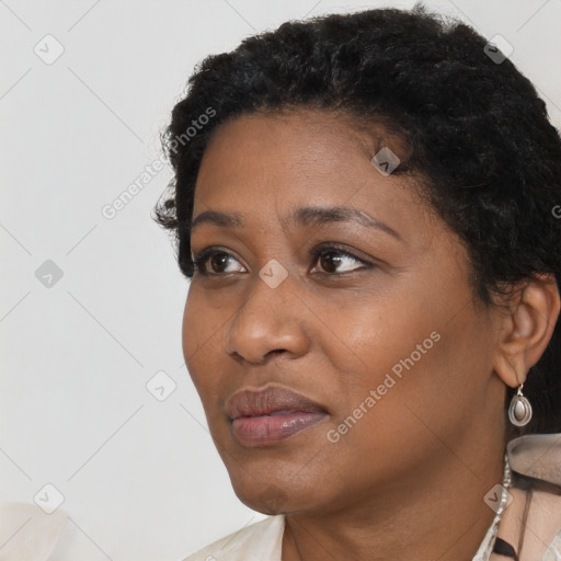 Neutral black young-adult female with short  black hair and brown eyes