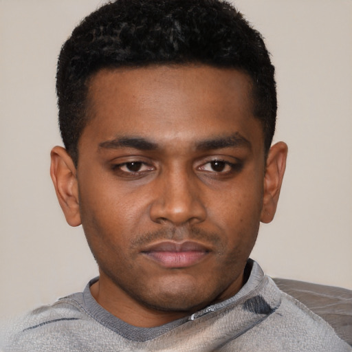 Neutral latino young-adult male with short  brown hair and brown eyes