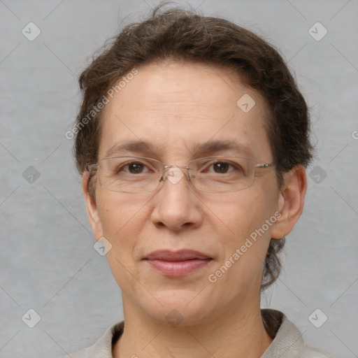 Joyful white adult female with short  brown hair and brown eyes