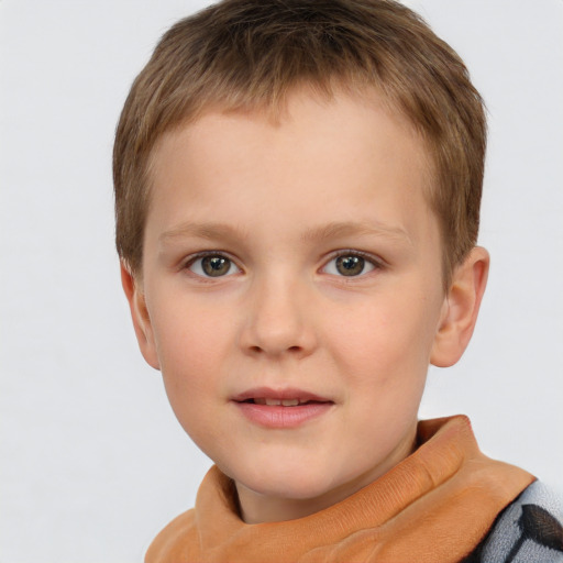 Joyful white child male with short  brown hair and brown eyes