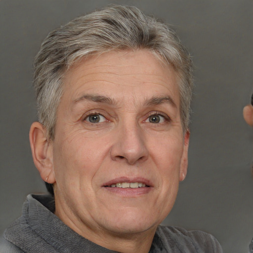 Joyful white middle-aged male with short  brown hair and brown eyes